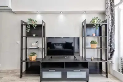 Una televisión o centro de entretenimiento en HDFM Collection - Yumbo Paradise