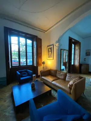Zona de estar de Comfortable Room in Historic Casa Quesada Shared House