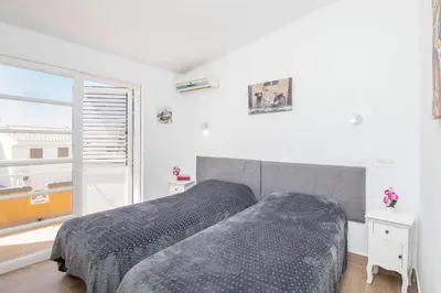 Cama o camas de una habitación en Casa Di Ginny Sonneland