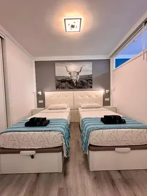 Cama o camas de una habitación en Appartamento moderno centrale WIFI Free b