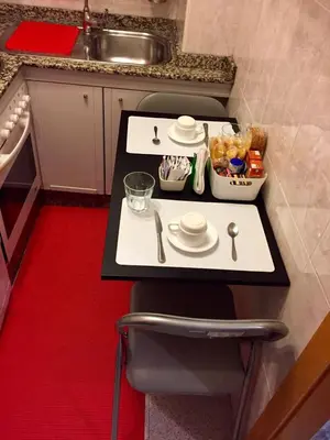Una cocina o zona de cocina en Appartamento moderno centrale WIFI Free b