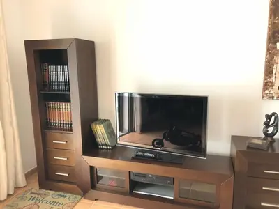 Una televisión o centro de entretenimiento en Casa CUKITO