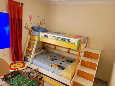 Cama o camas de una habitación en Three-bedroom apartment