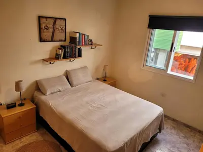 Cama o camas de una habitación en Three-bedroom apartment