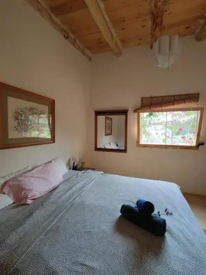 Cama o camas de una habitación en Nature Sanctuary, a semi-detached house on an ecological & sustainable farm
