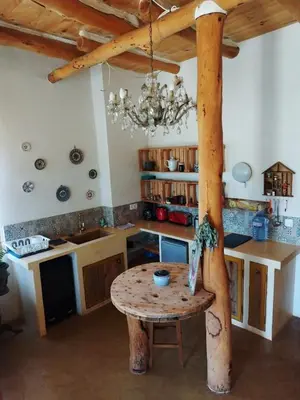 Zona de estar de Nature Sanctuary, a semi-detached house on an ecological & sustainable farm