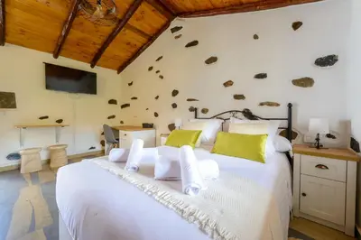 Cama o camas de una habitación en Quinta Entre Palmeras - Viviendas Vacacionales