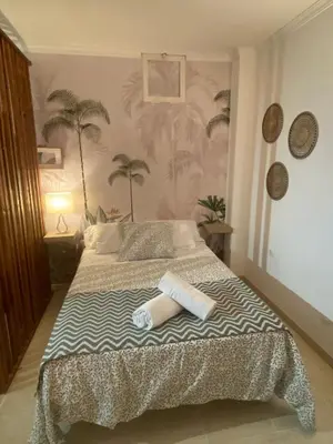 Cama o camas de una habitación en Arinaga Chakra Home