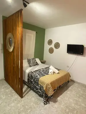 Cama o camas de una habitación en Arinaga Chakra Home