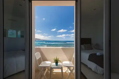 Cama o camas de una habitación en Sunset Paradise