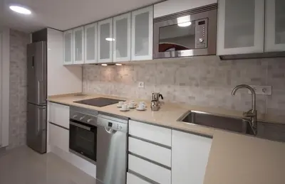 Una cocina o zona de cocina en Terrace Penthouse Las Canteras beach
