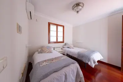 Cama o camas de una habitación en La Canariona, a charming country house