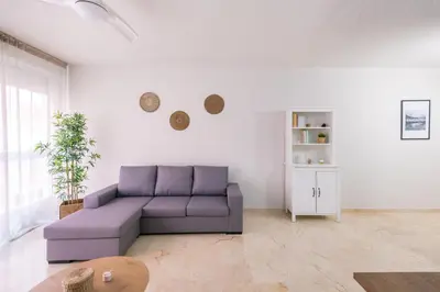 Zona de estar de Apartamentos Maresía by Infinity Summer