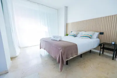 Cama o camas de una habitación en Apartamentos Maresía by Infinity Summer