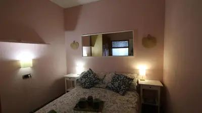 Cama o camas de una habitación en Mahalo Holiday House