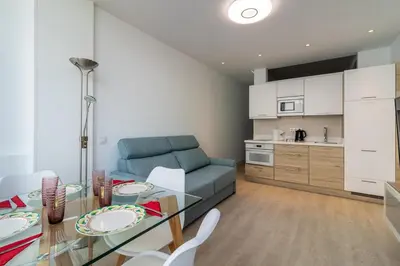 Una cocina o zona de cocina en GuestReady - Atardecer Canteras LJones Vistas al mar y reformado