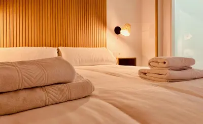 Cama o camas de una habitación en Click&Guest - Modern and Luxury Flat in Telde