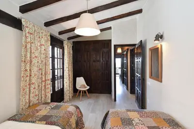 Cama o camas de una habitación en Arpones by Villagrancanaria