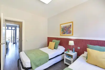 Cama o camas de una habitación en Dúplex Meloneras Bahía 7 by Villagrancanaria