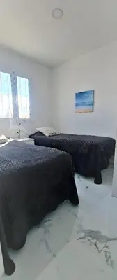 Cama o camas de una habitación en Oasis en Las Palmas