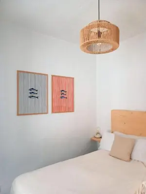 Cama o camas de una habitación en Dragon View - Oceanfront Apartment Faro de Sardina