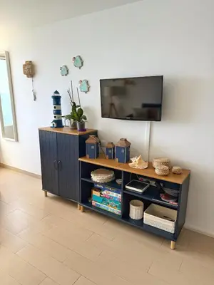 Una televisión o centro de entretenimiento en The sea at your feet
