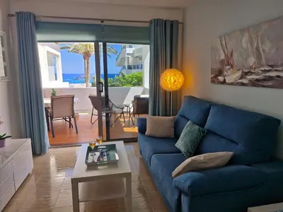 Zona de estar de Aida - apartamento junto a la playa con vistas al océano