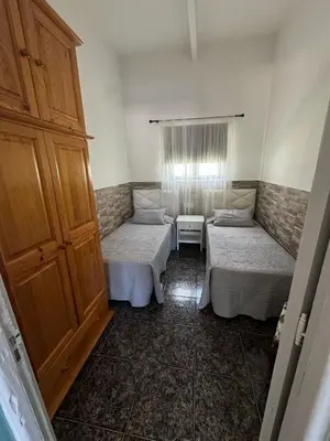 Cama o camas de una habitación en Vivienda Vacacional Casa Aguatona