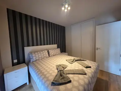 Cama o camas de una habitación en 8i Chile 51