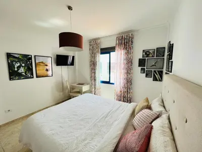 Cama o camas de una habitación en Santa Claudia - Your Home Away from Home