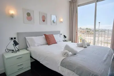 Cama o camas de una habitación en Apartamentos Bellavista