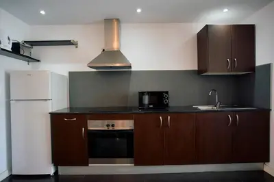Una cocina o zona de cocina en Apartamentos Bellavista