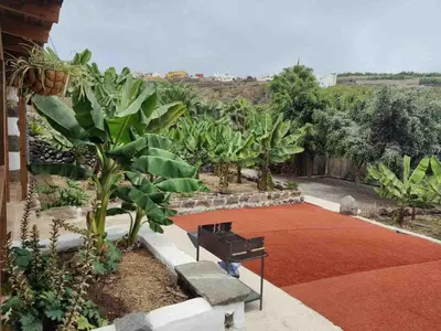 Jardín al aire libre en Casita entre plataneras, a 10 minutos Playa