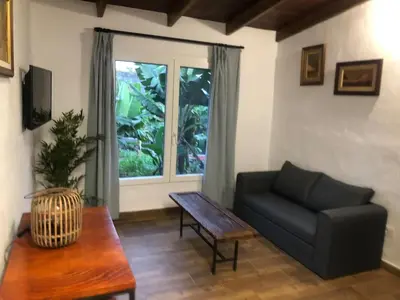 Zona de estar de Casita entre plataneras, a 10 minutos Playa