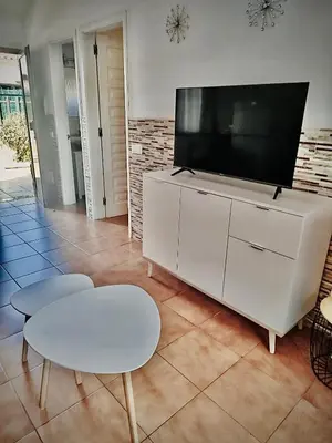 Una televisión o centro de entretenimiento en Sunny Haven II Santa Fe - Maspalomas