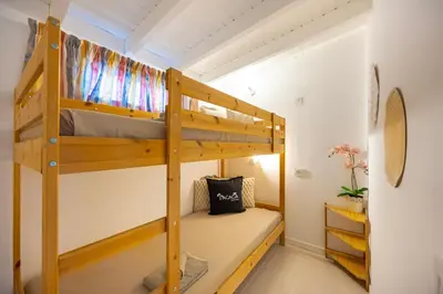 Cama o camas de una habitación en 3BR Tauro Bungalow - Garden, Terrace, Sleeps 6
