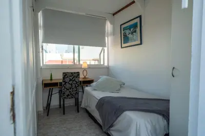 Cama o camas de una habitación en Canteras Ocean Terrace - Atico con terraza y vistas a las Canteras