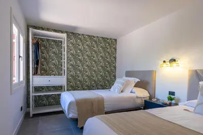 Cama o camas de una habitación en Los Albaricoques 12 by VillaGranCanaria
