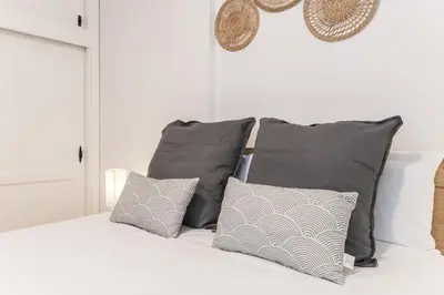 Cama o camas de una habitación en Home2Book Chic Apartment Near The Sea, La Garita