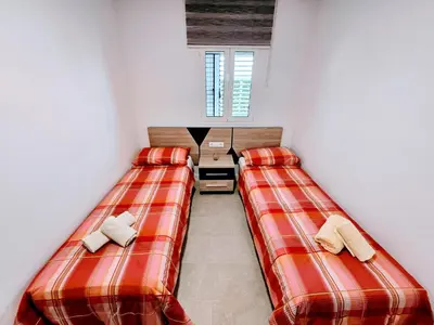 Cama o camas de una habitación en Demelza Holiday Residence
