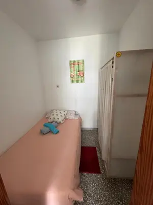 Cama o camas de una habitación en La casita de Bécquer Habitaciones compartidas