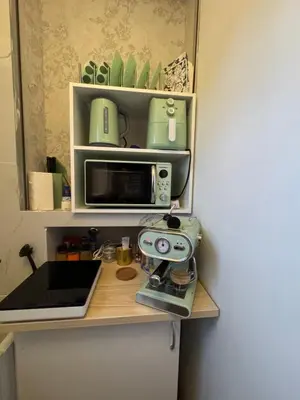 Una cocina o zona de cocina en Room Mayi GC