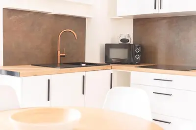 Una cocina o zona de cocina en Preciosa Reina