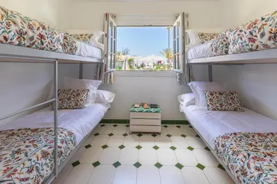 Cama o camas de una habitación en Campo Golf 75 by VillaGranCanaria