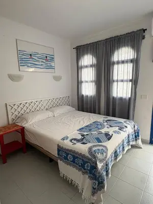 Cama o camas de una habitación en Sunny poolview bungalow in Maspalomas