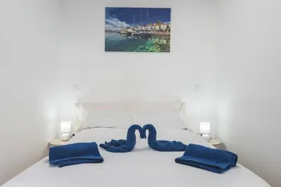 Cama o camas de una habitación en Tina Canteras Beach