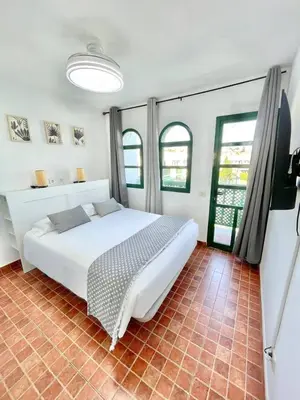 Cama o camas de una habitación en Paradise Sun & Pool Maspalomas