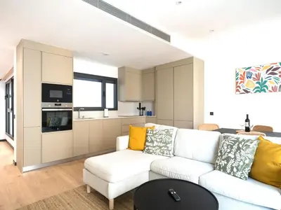 Una cocina o zona de cocina en Apartamento Playa Las Canteras con gimnasio A2D
