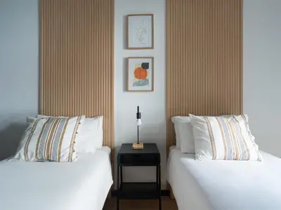 Cama o camas de una habitación en Gran apartamento cerca de playa Las Canteras con gimnasio A3B