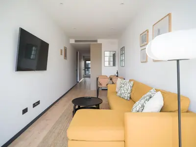 Zona de estar de Gran apartamento cerca de playa Las Canteras con gimnasio A3B